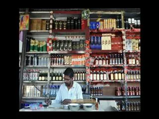 Governement planed cheep licker to people - Sakshi