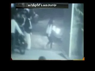 Drunk Youth Beating Up Security Guard In Jamshedpur hotel - Sakshi