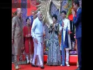 PM Narendra Modi attends wedding reception of Congress leader Abhishek Singhvi's son - Sakshi