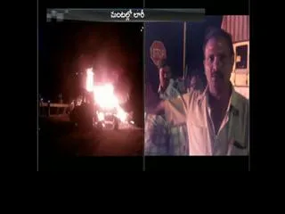 Lorry Burns After Hits Divider at Tufran Tollgate || Medak - Sakshi