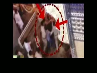 Mumbai Police mercilessly beats woman for trying to enter Ganpati pandal through VIP gate - Sakshi