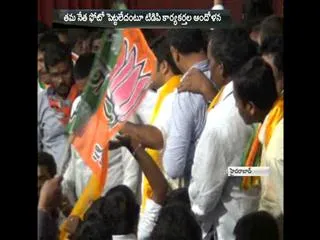 tdp, bjp activists fight in uppal - Sakshi
