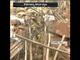 landslides fell down in the Tirumala ghat road - Sakshi