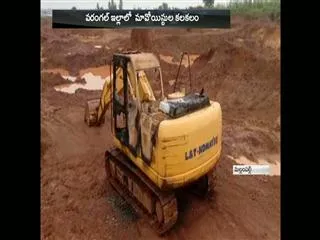 Maoist fires the jcb at warangal district - Sakshi