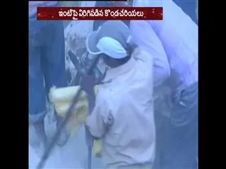 Landslides fall down on houses - Sakshi
