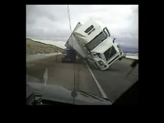 track falls off car during Storm winds in US - Sakshi