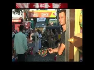 Russian man found begging at Kanchipuram - Sakshi