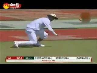 Mohammad Amir take a dazzling catch to dismiss Darren Bravo - Sakshi