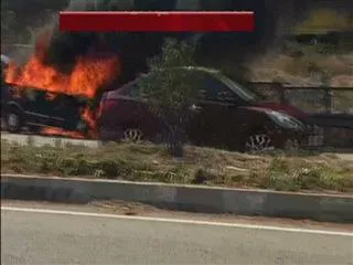 Car catches fire at  patancheru Outer Ring Road - Sakshi
