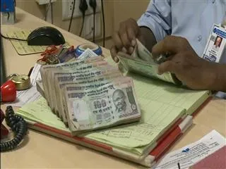 Government to bear transaction cost of payments received via cards - Sakshi