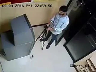 two men traying to theft atm money - Sakshi