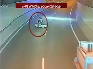 Flying Mattress Hits Biker, But Also Saves His Life - Sakshi
