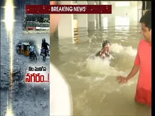 water flow into apartment in nizampet - Sakshi
