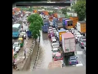 Downpour stalls Delhi - Sakshi