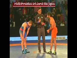 yoga guru Baba Ramdev beats Olympic medallist Andrey Stadnik in friendly match - Sakshi