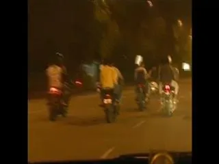 Riding a bike at India Gate in Delhi - Sakshi