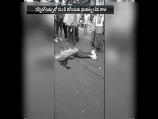 Youth gets off moving bus, crushed under wheels in hyderabd - Sakshi