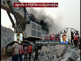 heavy machinery fire in polavaram project - Sakshi
