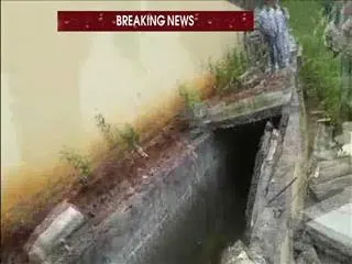 removal-of-encroachment-on-nallah - Sakshi