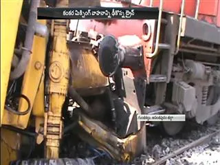Train engine collision Gravel machine - Sakshi
