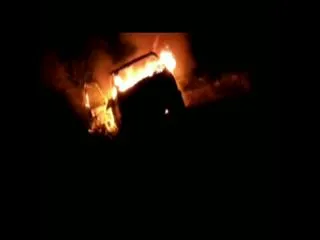 Burning car on the road in Guntur district - Sakshi
