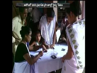 Free health camp for flood-hit people in Assam - Sakshi