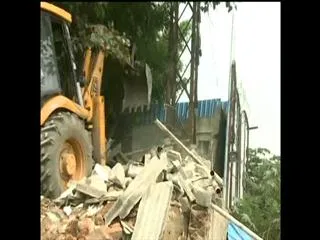 destroying of illegal constructions in hyderabad - Sakshi