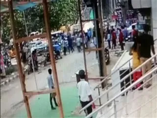 fight in freshers party: students groups roadside show - Sakshi