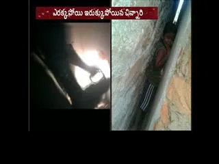 child stuck between two hoses in kadapa - Sakshi