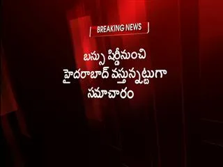 bus burnt in karnataka, telugu kid dies - Sakshi