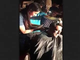 actress gives Anurag Basu a haircut - Sakshi