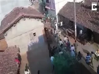 Forest Ranger Jumps Off Roof To Escape Leopard - Sakshi