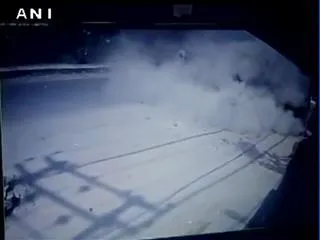 Narrow escape for two as truck falls off a flyover in Jalandhar - Sakshi