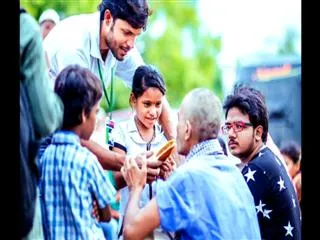 Goutam serving the orphans - Sakshi