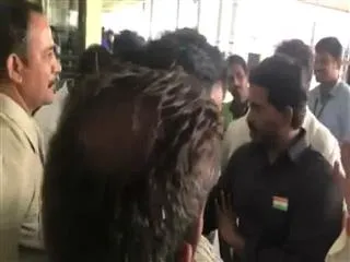 YS Jagan Mohan Reddy slams police attitude in vizag airport - Sakshi