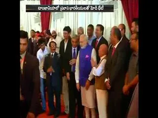 PM Modi plays drum along with Tanzanian President John Magufuli - Sakshi