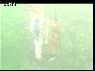 Couple get married mid air, suspended over a 1000 feet ditch, hanging on a ropeway in Kolhapur (Maharashtra). - Sakshi