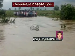 Car washed away in flood - Sakshi
