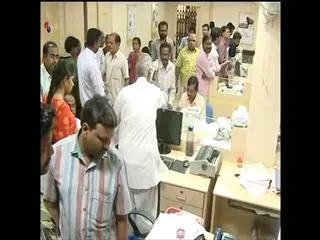 Unaccounted deposits disclosed to taxman face 50 per cent tax, lock-in - Sakshi