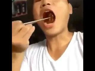 Horrific moment baby rodents are dipped into a sauce and then eaten ALIVE as Chinese delicacy - Sakshi