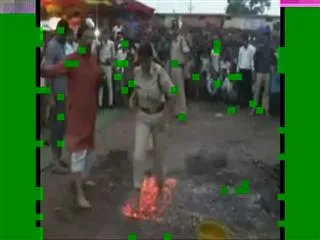 Mungeli SP, IG walk over live fire to prove no superstition - Sakshi