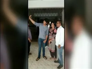 Excise Department staff took selfie with Puri's Son Aakash - Sakshi