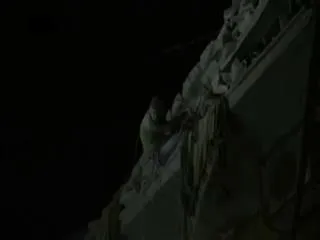 Aleppo airstrike: footage shows boy dangling by legs from building - Sakshi