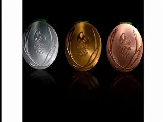 Rio silver medal auctioned for cancer treatment of small kid - Sakshi