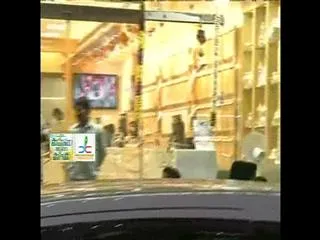 income tax officers rides on gold shoes - Sakshi