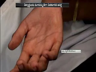 teacher beats students at kamareddy district - Sakshi