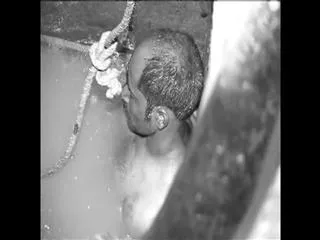Mentally ill man falling down Underdrainage in tirumala - Sakshi