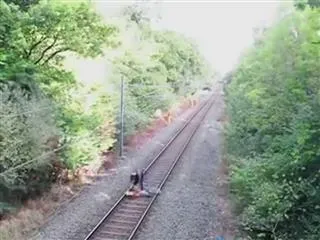 Heroic Railway Worker Saves A Man From A Speeding Train - Sakshi