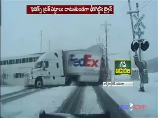 Train derails in Holland after hitting truck - Sakshi
