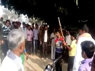 Woman molested in busy market in UP's Mainpuri, beaten up with stick for resisting, suffers head injury - Sakshi